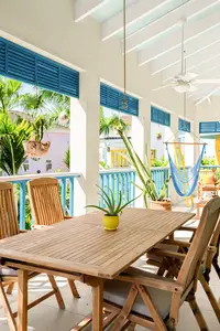 Two-Bedroom Casita terrace at Boardwalk Boutique Hotel Aruba with outdoor dining and lounge area.
