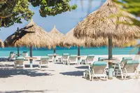 Boardwalk Beach Area with beach lounge chairs and palapas