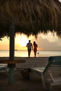 Romantic couple sunset drinks