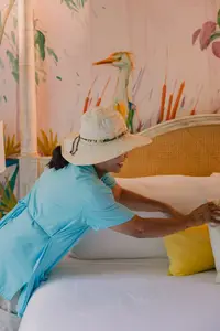 Linen Reuse program Housekeeping preparing a guest room at Boardwalk Boutique Hotel Aruba