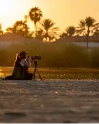 Sunset beach moment in Aruba, captured by Nathalie Clemens for the Boardwalk Boutique Hotel Aruba Artist in Residence story.