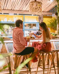 coco-cafe-couple-at-bar-boardwalk-boutique-hotel-aruba.jpg